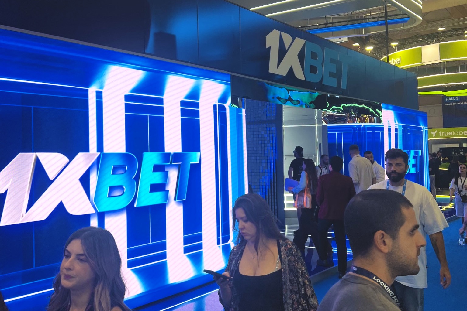 Busy expo floor and operator stands at SBC Summit Lisbon 2026